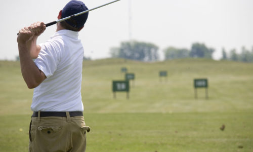 Golf In Front Of Driving Range