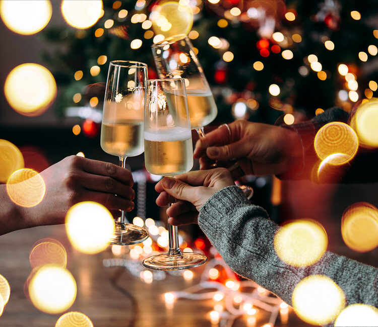 People giving a toast with champagne glasses